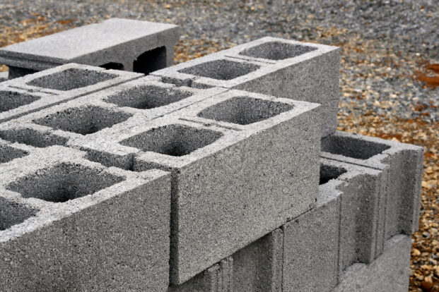 Concrete blocks stocked at building material depot.