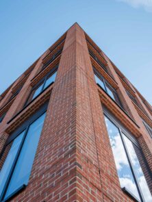 Red brick slips supplied to commercial development in Woking.