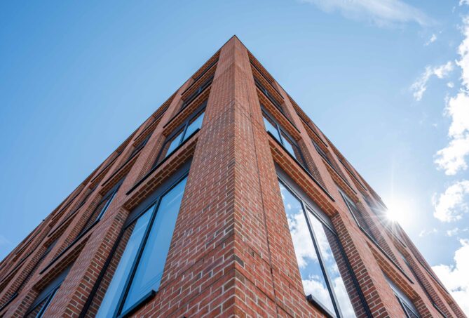 Red brick slips supplied to commercial development in Woking.