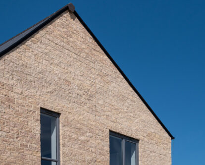 Split faced reconstituted walling stone supplied to housing development in Harrogate.
