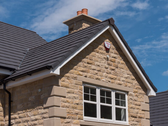 Concrete roof tiles supplied to housing development.