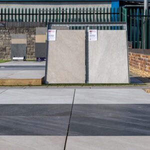An outdoor landscaping display area showing porcelain paving slabs.