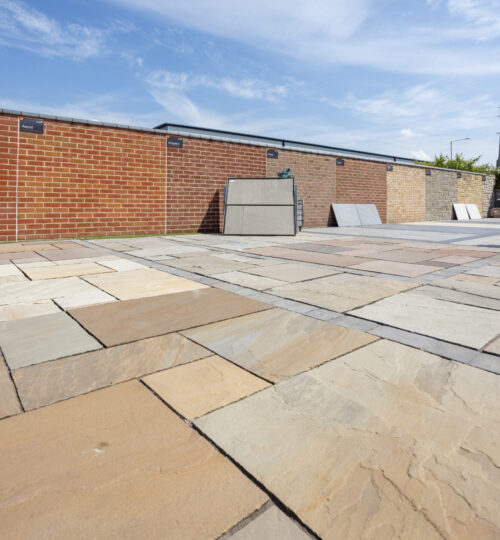 An outdoor display area of stone paving slabs