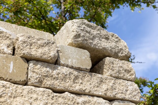 A stack of buff coloured stone bricks.