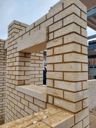 pale cream stone bricks dark mortar