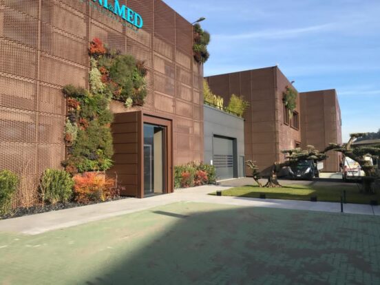 Copper mesh cladding with planting