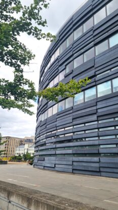 Grey GRC cladding with linear profiles at Flundran