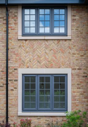 Luxury dwelling in Hayfield Crescent with herringbone brickwork under the window