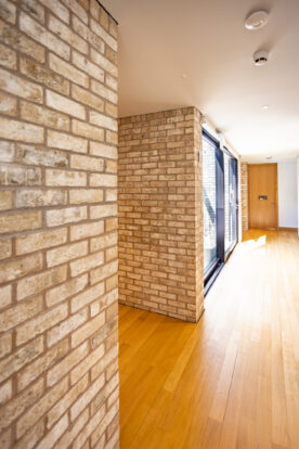 Internal brick slip panels at the Alder Centre