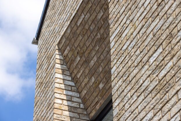 Prefabricated brick panels at the Gables