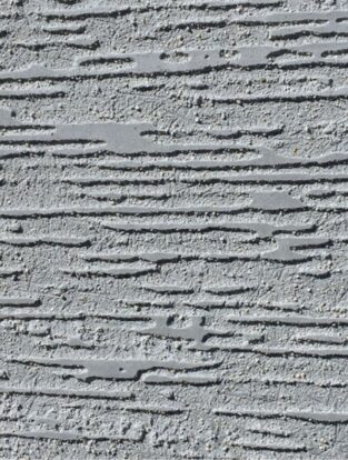 Scratch effect raised GRC cladding profile