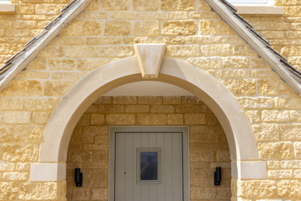 Stone arch detail and natural walling stone