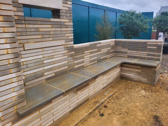 White and grey linear bricks made of stone