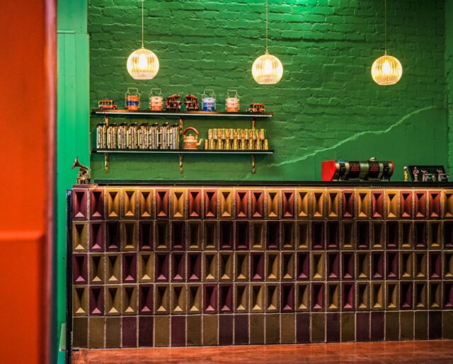 A bar built from pink and yellow bricks with their frogs facing outwards.