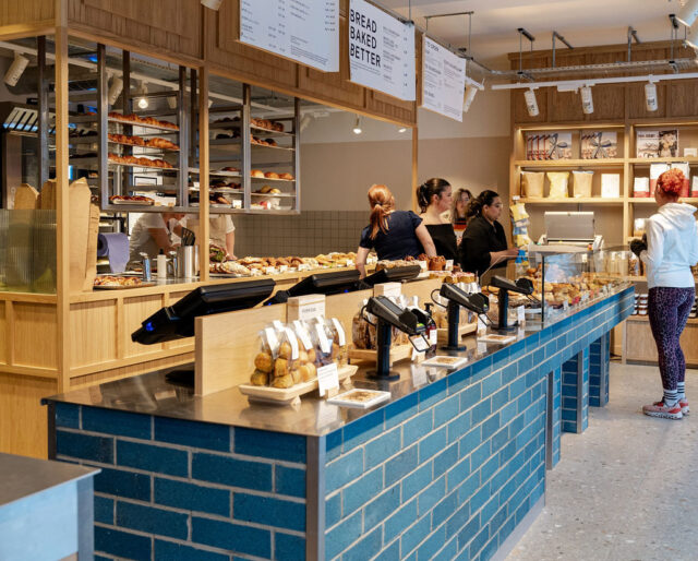 A blue brick counter in a bakery.