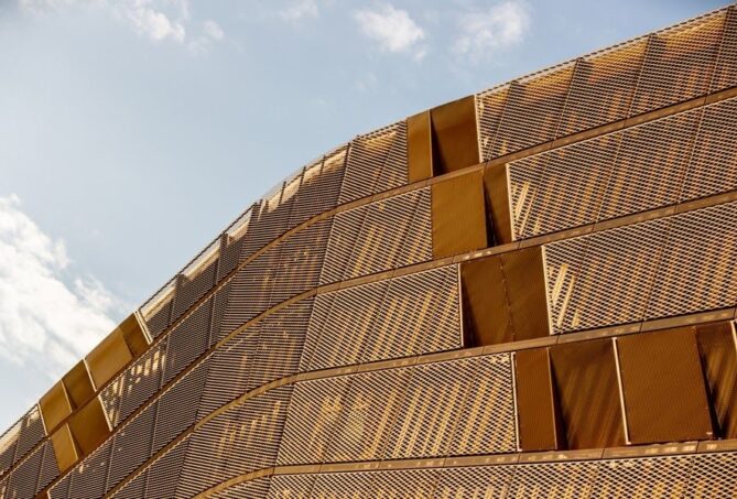 Gold mesh cladding on Ethiad Arena