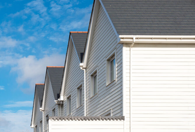 Arctic white hardie plank fibre cement cladding supplied to residential development.