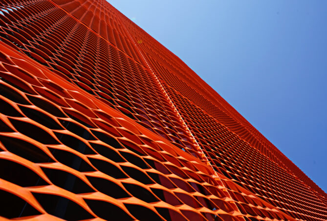 Bright orange mesh cladding