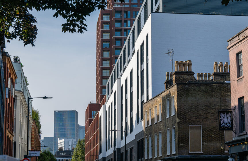 Grey linear bricks, white glazed bricks and white painted bricks used on commercial development in central london.