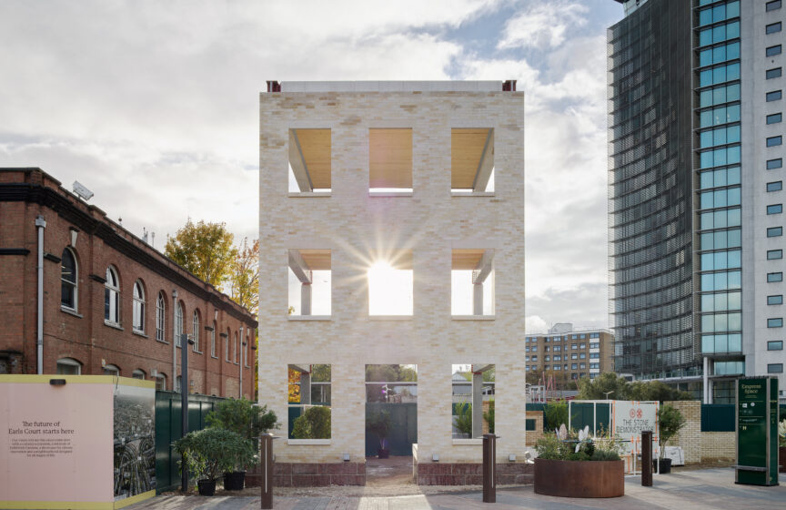 An image of a hollowed out building, constructed to show the internal structure. Made from stone bricks.